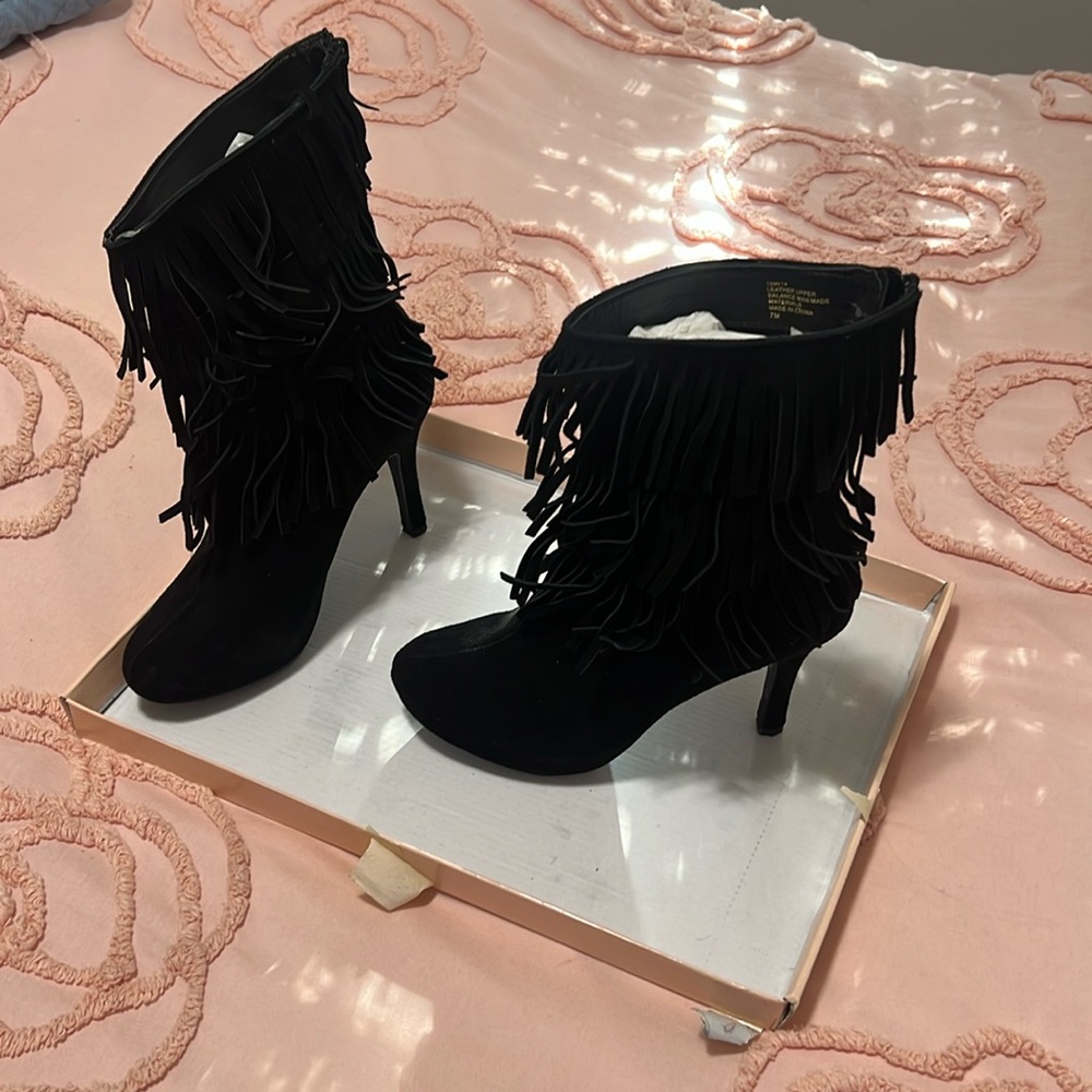 Theme fringe boots